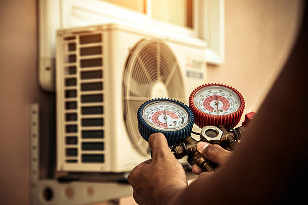 Professional Hvac technician working in Ferguson, NC